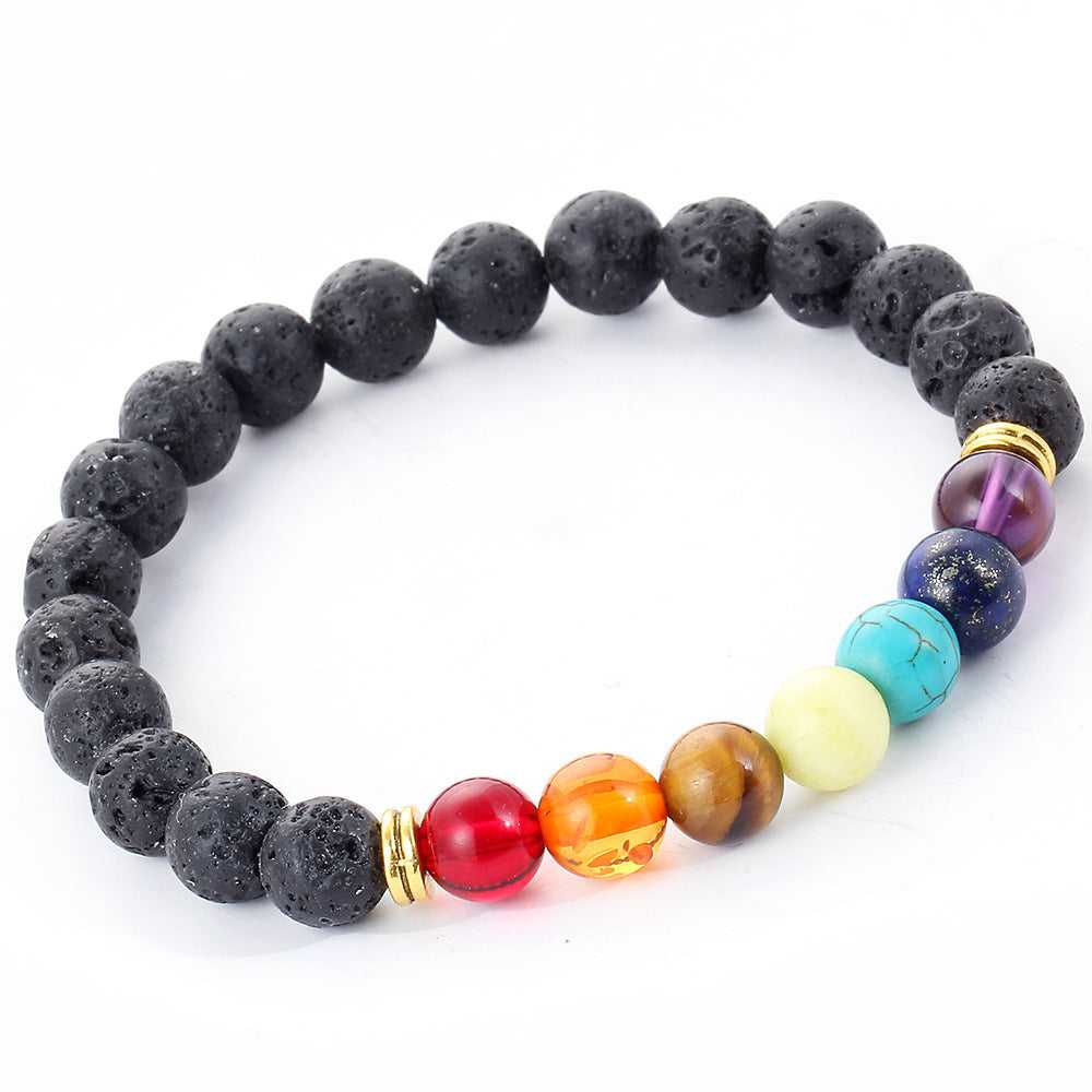 Black lava bead bracelet featuring multicolored glass beads and gold spacers, elastic stretch for wrist fit