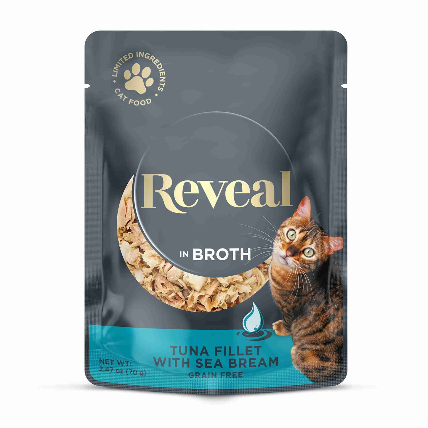 Close-up of gray cat food pouch showing the Reveal brand logo, tuna fillet with sea bream in broth, and a playful cat image
