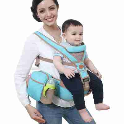 Smiling woman wearing a pastel blue baby front carrier waist stool with her toddler, ergonomic design with adjustable straps and storage, for hands-free baby carrying