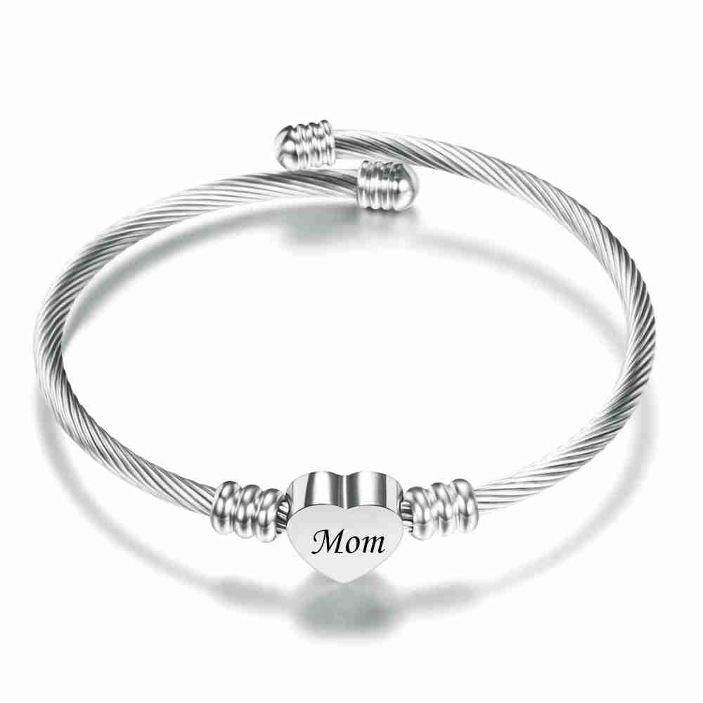 Silver stainless steel braided bracelet with heart charm engraved 'Mom', adjustable design, ideal for Mother's Day gift