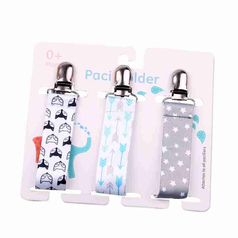 Set of three colorful baby pacifier teether clips with fun animal and arrow designs, made of durable material, perfect for securing pacifiers.