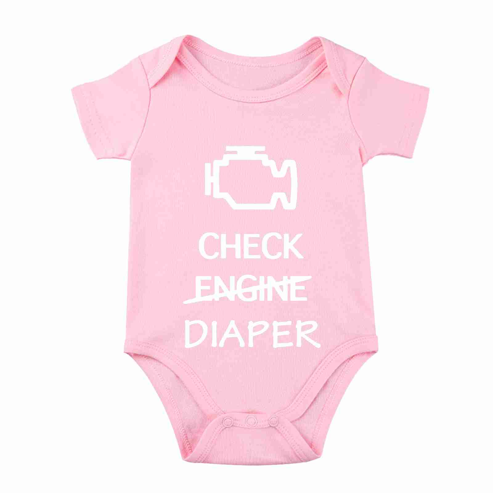 Close-up of pink baby bodysuit featuring a check engine graphic and playful text, designed for infants, with short sleeves and snap buttons.