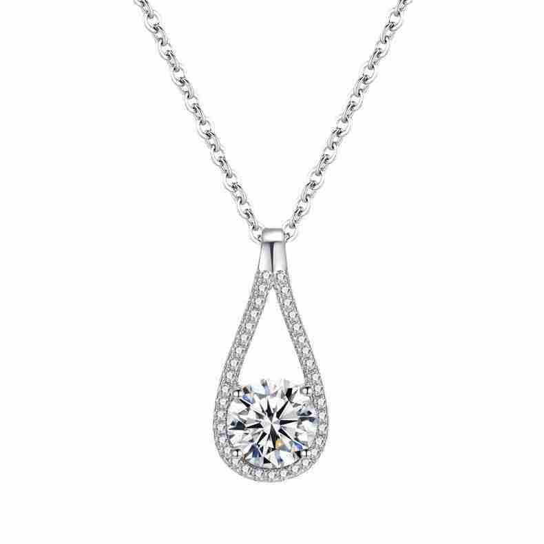 Close-up of silver necklace with a teardrop pendant adorned with sparkling cubic zirconia stones, stylish jewelry for women - SKU: 1789112202074787841