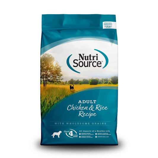 Blue bag of NutriSource adult dog food with chicken and rice, featuring a scenic landscape with trees and a dog silhouette, SKU: B0053H9IYY