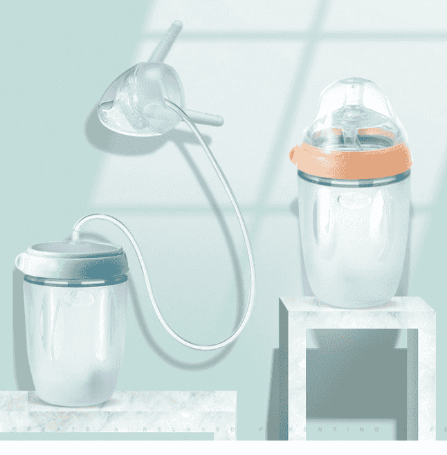 Child-friendly silicone sippy training cup with straw, leak-proof lid, and flexible ring, designed for easy toddler use in modern kitchen
