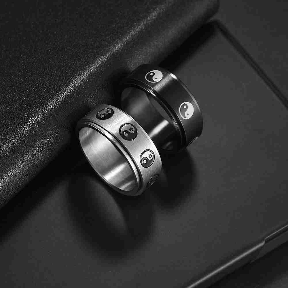 Black stainless steel gossip ring featuring yin-yang symbols, sleek design, ideal for piercing or fashion, SKU: 1798309628090585097